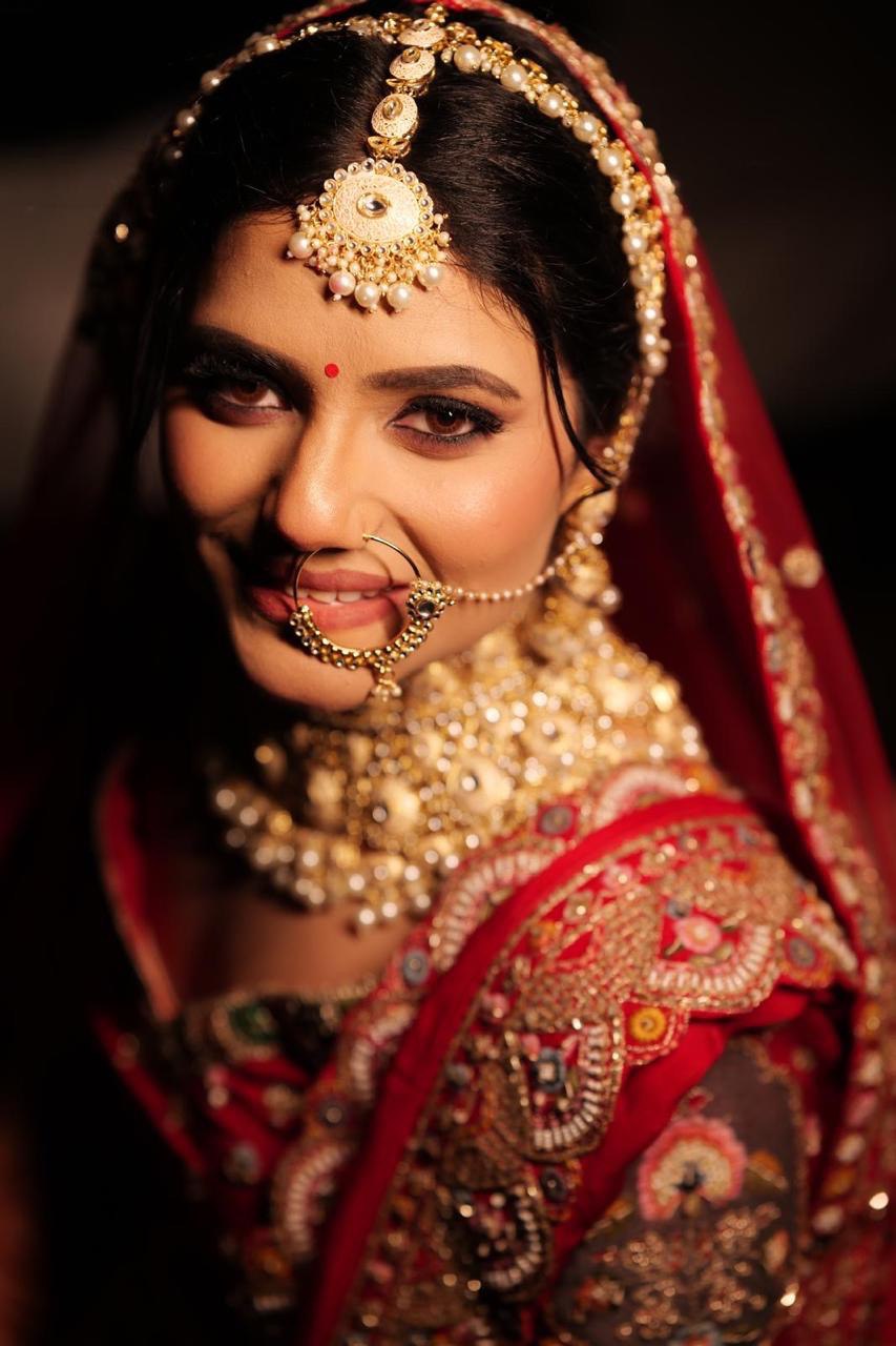 Modern airbrush bridal makeup with soft glam look and subtle shimmer by Ritika Verma Ghaziabad