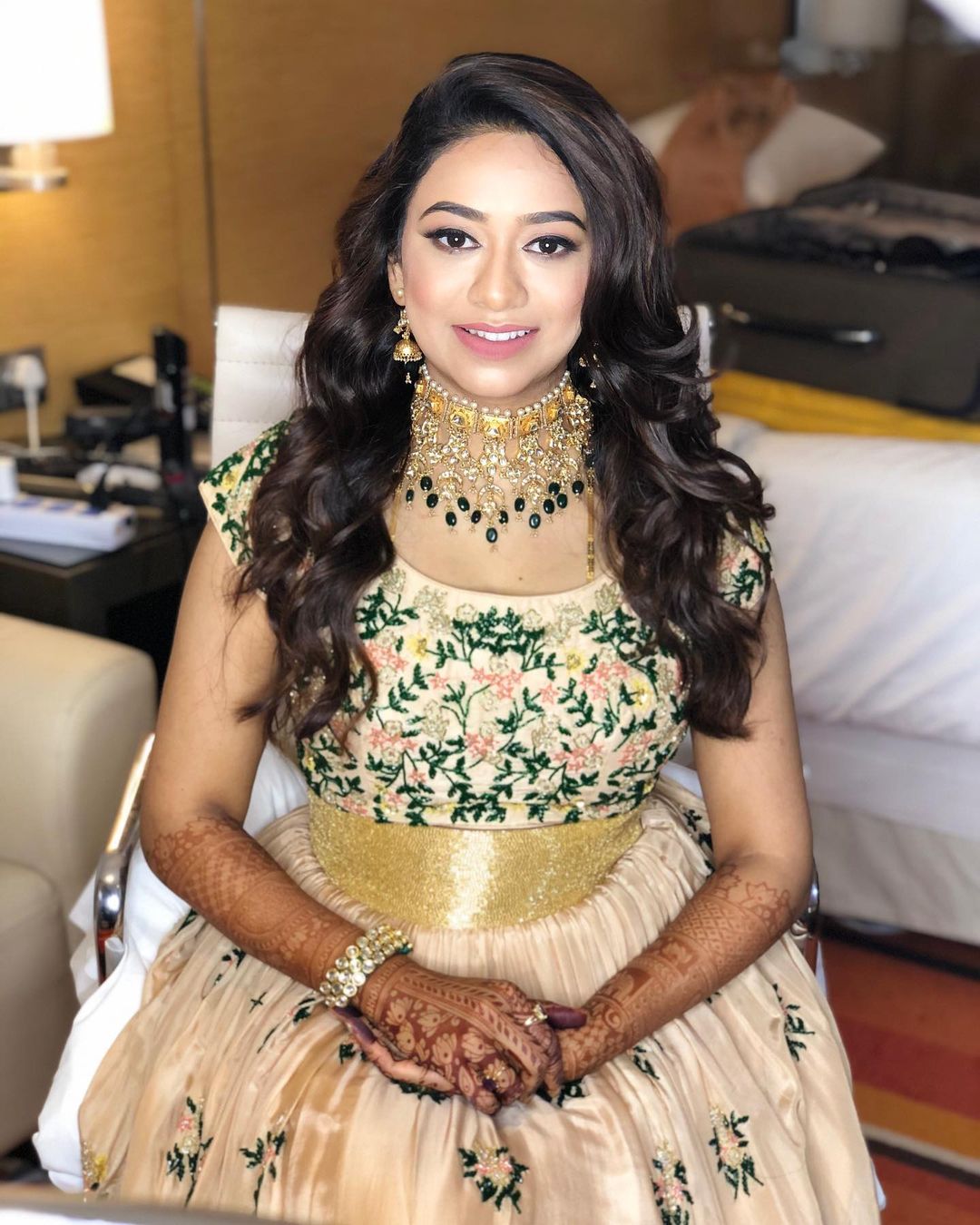 Soft reception makeup featuring dewy skin and pink tones by Ritika Verma Noida